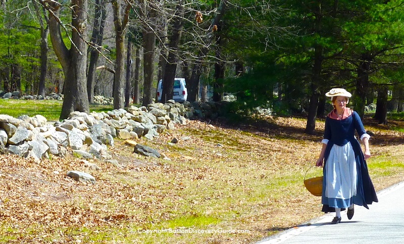 Reenactor dressed as a Colonial woman