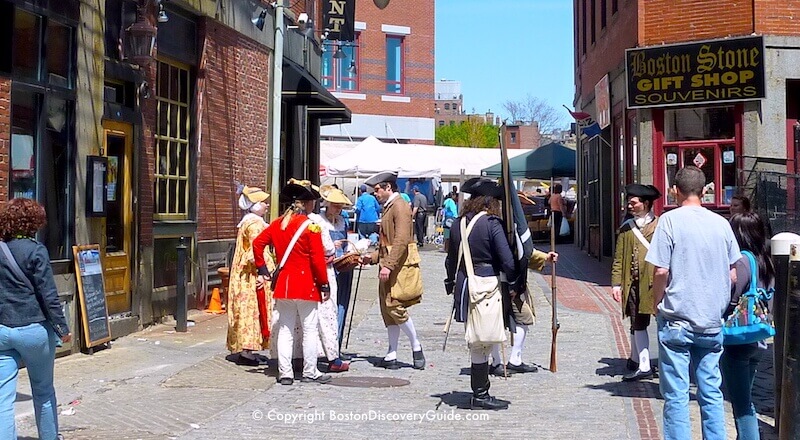 Reenactors in Colonial clothing on Hanover Street in historic Downtown Boston Reenactors in Colonial clothing on Hanover Street in historic Downtown Boston