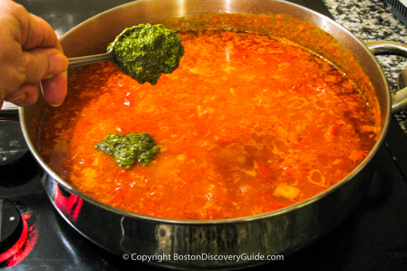 Pouring the pasta into the pot