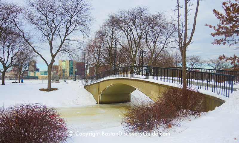 Winter walking tour of Boston: Footbridge across a canal on the Esplanade Winter walking tour of Boston: Footbridge across a canal on the Esplanade