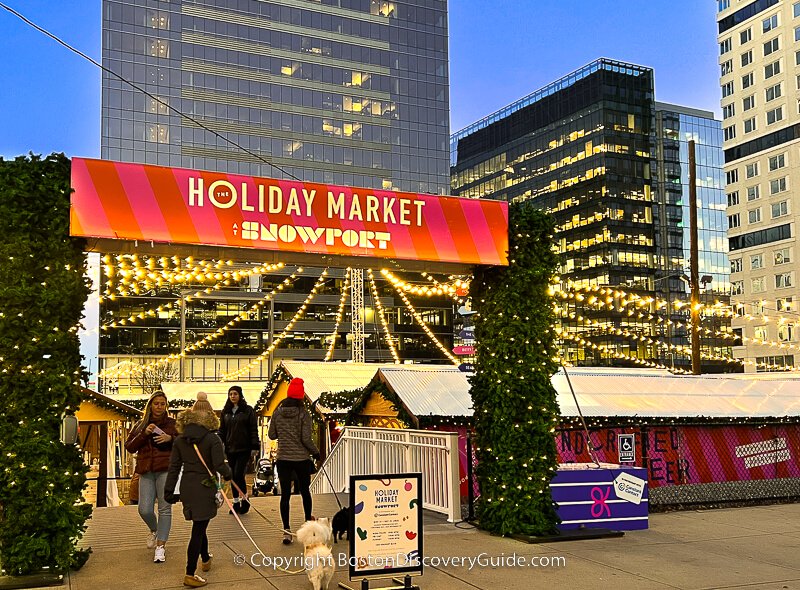 Christmas Trees and artisan chalets at the Holiday Market in Boston's Seaport