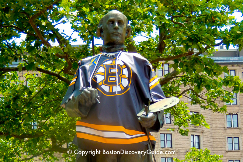 John Singleton Copley statue dressed in a Bruins shirt in Boston's Copley Square in Back Bay John Singleton Copley statue dressed in a Bruins shirt in Boston's Copley Square in Back Bay
