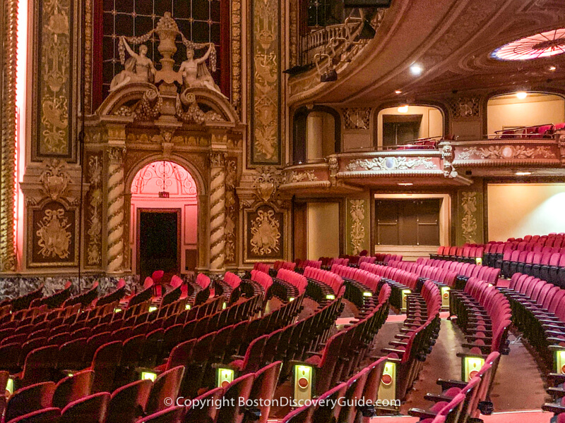 Ornate columns, frescoes, and sculpture at the Wang Theatre