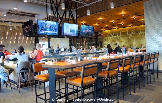 Bar and big screens at Earl's Kitchen in Assembly Row Bar and big screens at Earl's Kitchen in Assembly Row